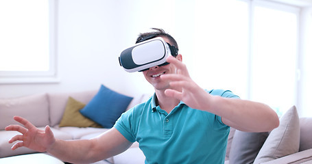 Image showing man using VR-headset glasses of virtual reality