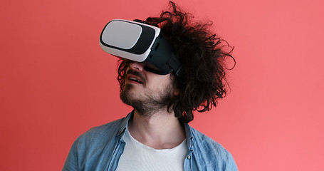 Image showing young man using VR headset glasses of virtual reality