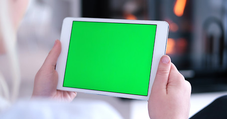 Image showing woman on sofa using tablet computer