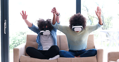 Image showing Multiethnic Couple using virtual reality headset