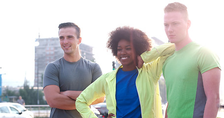 Image showing Portrait of multiethnic group of young people on the jogging