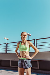 Image showing Fit fitness woman posing at city