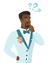 Image showing Young african-american groom with question marks.