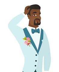 Image showing Young african-american groom scratching his head.