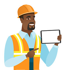 Image showing African-american builder holding tablet computer.