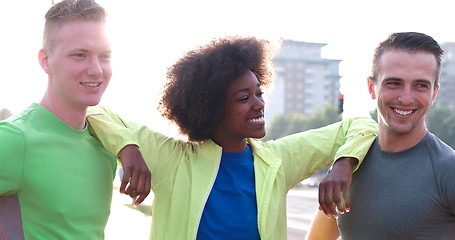 Image showing Portrait of multiethnic group of young people on the jogging