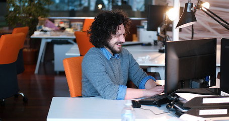 Image showing businessman working using a computer in startup office