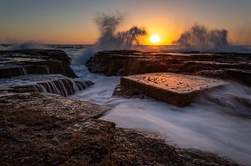 Image showing North Narrabeen coastal sunrise with wave splash