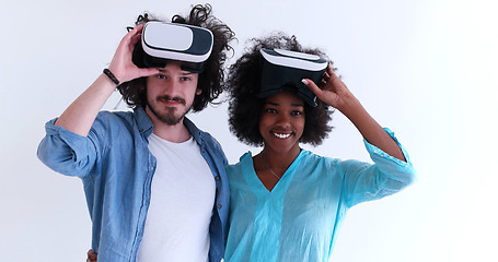 Image showing multiethnic couple getting experience using VR headset glasses