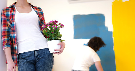 Image showing happy young couple doing home renovations