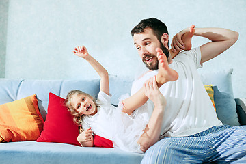 Image showing Father and his six years kid girl at home