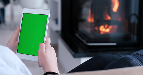 Image showing woman on sofa using tablet computer