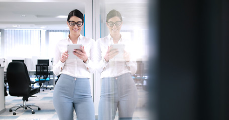 Image showing Business Woman Using Digital Tablet in front of Office