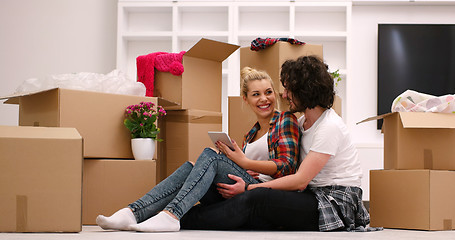 Image showing young couple moving  in new house