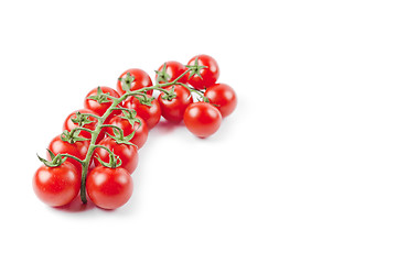 Image showing Fresh organic cherry tomatoes bunch isolated on white background
