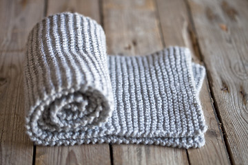 Image showing Hand knitted grey scarf.