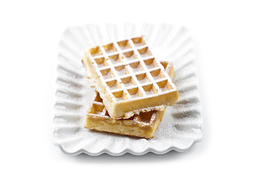 Image showing Belgium waffers with sugar powder on ceramic plate isolated on w