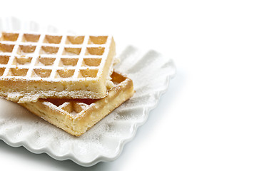 Image showing Belgium waffers with sugar powder on ceramic plate isolated on w