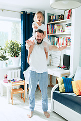 Image showing Father and his six years kid girl at home