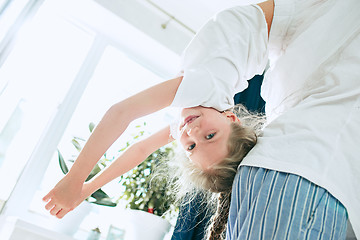 Image showing Father and his six years kid girl at home