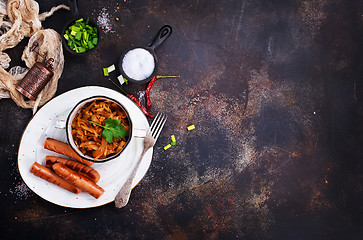 Image showing sausages with cabbage