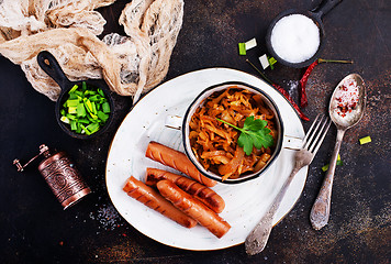 Image showing sausages with cabbage