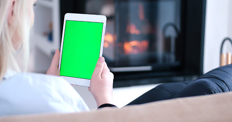 Image showing woman on sofa using tablet computer