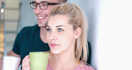 Image showing young couple enjoying morning coffee