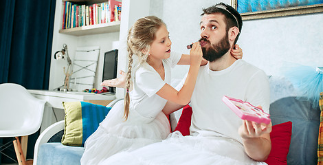 Image showing Father and his six years kid girl at home