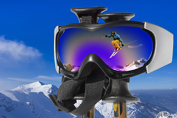 Image showing Jumping Skier in the Mountain a reflection in ski goggles