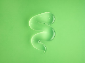 Image showing transparent gel on green background