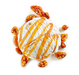 Image showing ice cream ball with maple syrup and caramelized walnuts