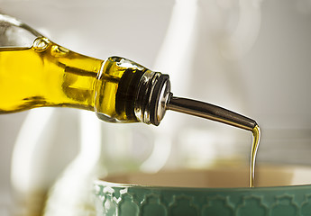 Image showing Oil pouring