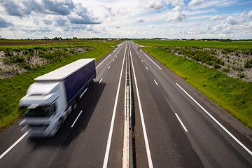 Image showing Motion blurred truck on the highway