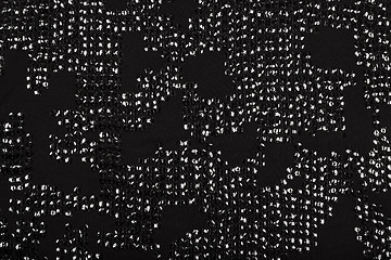 Image showing Black fabric with shiny reflective sequins