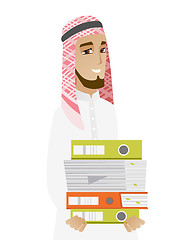 Image showing Muslim businessman holding pile of folders.