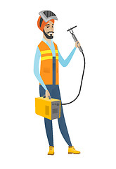 Image showing Young hindu welder holding gas welding machine.