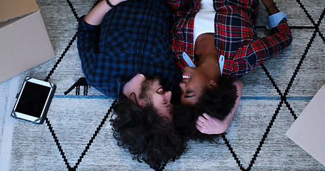 Image showing Top view of attractive young multiethnic couple