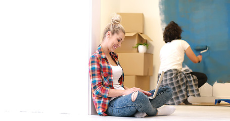 Image showing Happy couple doing home renovations