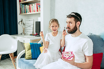 Image showing Father and his six years kid girl at home