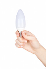 Image showing Female hand holding a light bulb