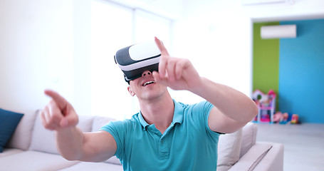 Image showing man using VR-headset glasses of virtual reality