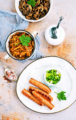 Image showing sausages with cabbage