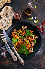 Image showing Fried mushrooms and cabbage