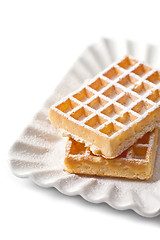 Image showing Belgium waffers with sugar powder on ceramic plate isolated on w