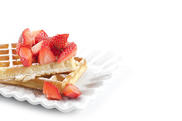 Image showing Belgium waffers with sugar powder and strawberries on ceramic pl