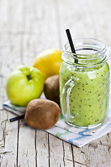 Image showing Green smoothie with kiwi, apple, lemon and chia seeds. Healthy f