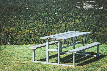 Image showing Picnic table on a mountain slope