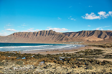 Image showing Landscape with volcanic hills and atlantic ocean in Lanzarote 