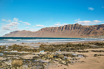 Image showing Landscape with volcanic hills and atlantic ocean in Lanzarote 